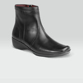 Olivia - Botín piel de borrego negro